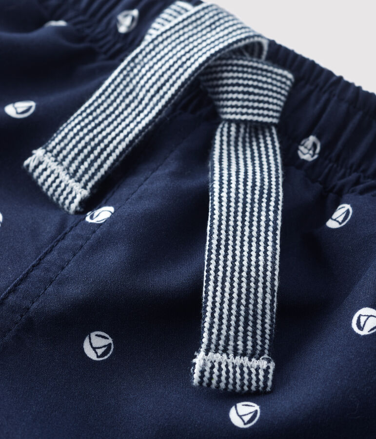 Short de bain en mati&egrave;re recycl&eacute;e b&eacute;b&eacute; bleu/blanc