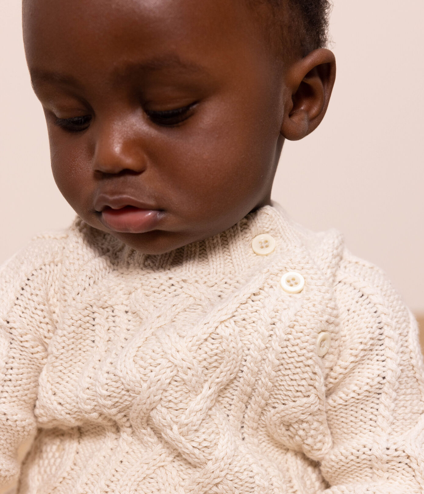 pull bebe tricot torsade